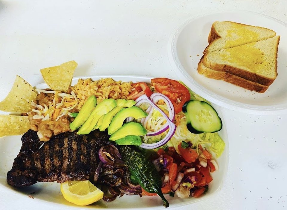 Restaurant menu featuring sandwiches and salads.